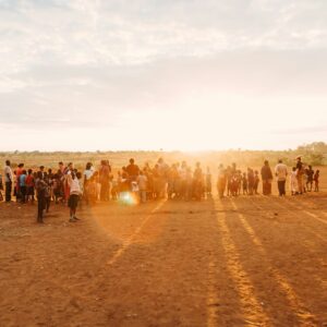 people on brown sand during daytime